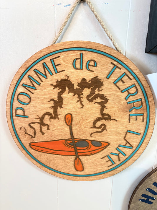 POMME KAYAK SIGN